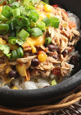 Slow cooker shredded chicken with corn, tomatoes and black beans. Prep this the night before and turn your crock pot on in the morning for an easy weeknight meal.