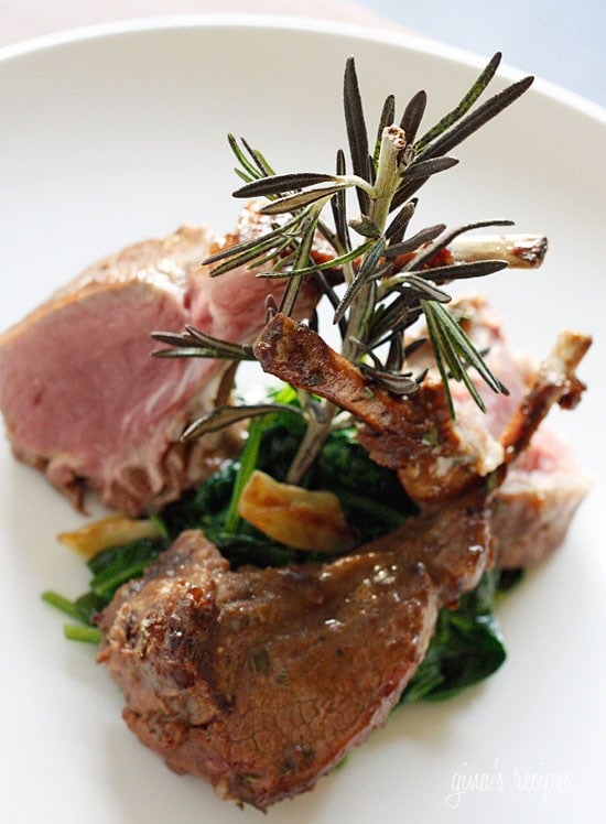 Lamb chops marinated with a glaze of Dijon mustard, garlic, balsamic vinegar and herbs served over a bed of wilted baby spinach in garlic and oil. This is so good you'll be licking the bones clean!